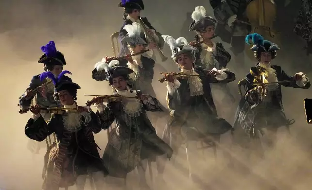 Artists perform during the closing ceremony of the 2026 Winter Olympics, in Verona, Italy, Sunday, Feb. 22, 2026. (AP Photo/Bernat Armangue)