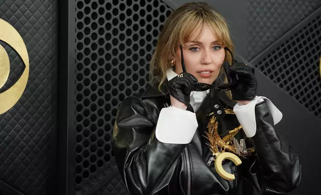 Miley Cyrus arrives at the 68th annual Grammy Awards on Sunday, Feb. 1, 2026, in Los Angeles. (Photo by Jordan Strauss/Invision/AP)