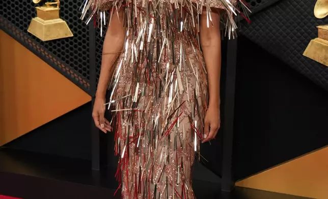 Jasmine Simpkins arrive at the 68th annual Grammy Awards on Sunday, Feb. 1, 2026, in Los Angeles. (Photo by Jordan Strauss/Invision/AP)
