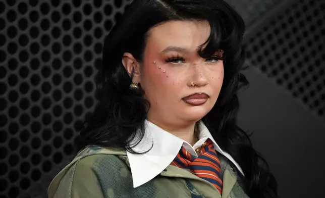 Lola Young arrives at the 68th annual Grammy Awards on Sunday, Feb. 1, 2026, in Los Angeles. (Photo by Jordan Strauss/Invision/AP)