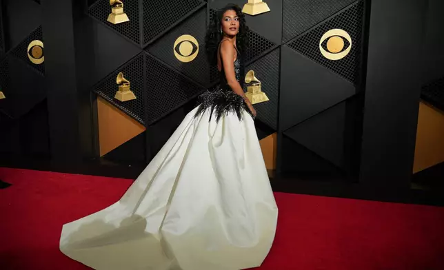 Olivia Dean arrives at the 68th annual Grammy Awards on Sunday, Feb. 1, 2026, in Los Angeles. (Photo by Jordan Strauss/Invision/AP)
