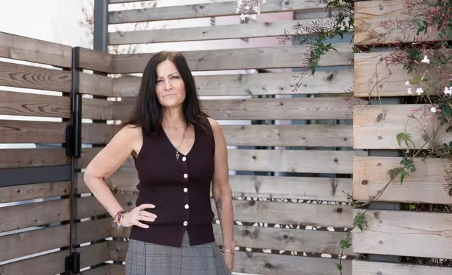 Jennifer Loving, CEO of Destination: Home, poses for a portrait outside of her office and housing units, Monday, Feb. 23, 2026, in San Jose, Calif. (AP Photo/Laure Andrillon)
