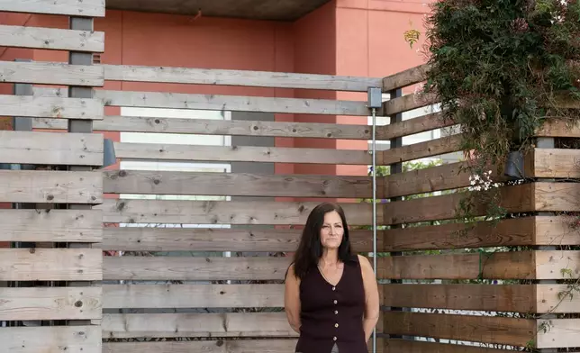 Jennifer Loving, CEO of Destination: Home, poses for a portrait outside of her office and housing units on Monday, Feb. 23, 2026, in San Jose, Calif. (AP Photo/Laure Andrillon)
