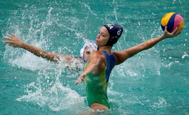 FILE - Brazil's Izabella Chiappini takes a shot against Russia during their women's water polo preliminary round match at the 2016 Summer Olympics in Rio de Janeiro, Brazil, Aug. 11, 2016. (AP Photo/Eduardo Verdugo, File)