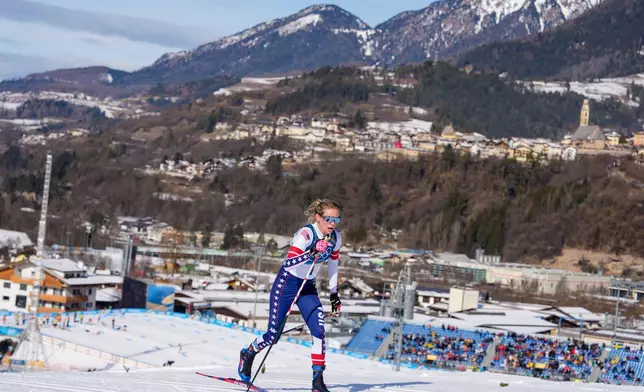 Jessie Diggins, of the United States, competes in the cross country skiing women's 50km mass start classic at the 2026 Winter Olympics, in Tesero, Italy, Sunday, Feb. 22, 2026. (AP Photo/Kirsty Wigglesworth)