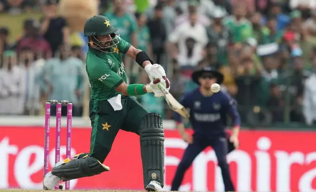 Pakistan's Sahibzada Farhan plays a shot during the T20 World Cup cricket match between Namibia and Pakistan in Colombo, Sri Lanka, Wednesday, Feb. 18, 2026. (AP Photo/Eranga Jayawardena)