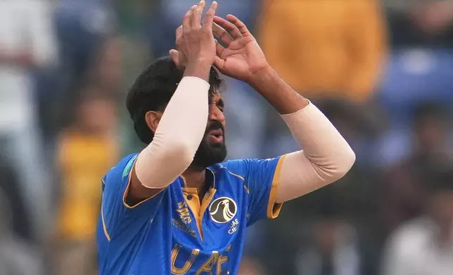 United Arab Emirates' Muhammad Arfan reacts after bowls a delivery during the T20 World Cup cricket match between South Africa and United Arab Emirates in New Delhi, India, Wednesday, Feb. 18, 2026. (AP Photo/Manish Swarup)