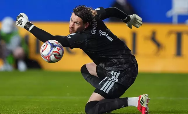 Toronto FC goalie Luka Gavran cannot stop a shot by FC Dallas forward Petar Musa, allowing a goal, during the first half of an MLS soccer match in Frisco, Texas, Saturday, Feb. 21, 2026. (AP Photo/LM Otero)