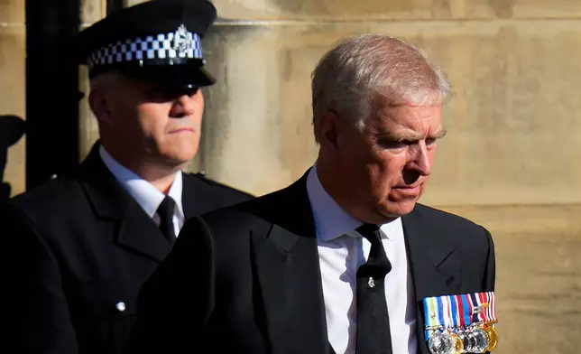 FILE - Prince Andrew leaves St. Giles Cathedral after the arrival of the coffin containing the remains of his mother Queen Elizabeth, in Edinburgh, Scotland, Sept. 12, 2022. (AP Photo/Petr David Josek, File)