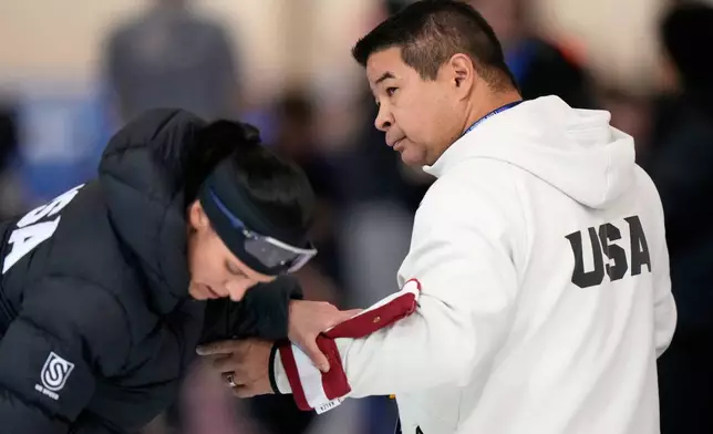 U.S. speedskating national coach Ryan Shimabukuro is seen at the U.S. Olympic trials for long track speed skating at the Pettit National Ice Center, Jan. 4, 2026, in Milwaukee. (AP Photo/Morry Gash)