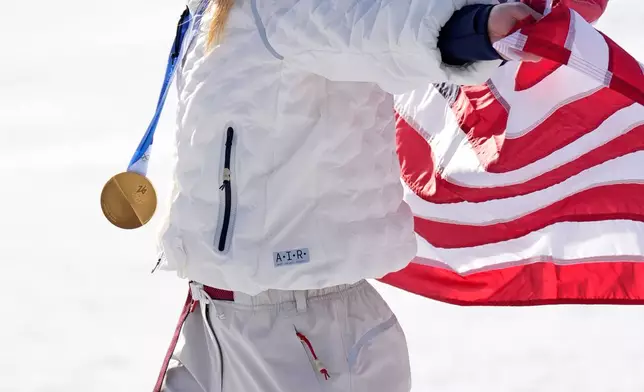 United States' Mikaela Shiffrin poses with the gold medal of the alpine ski, women's slalom race, at the 2026 Winter Olympics, in Cortina d'Ampezzo, Italy, Wednesday, Feb. 18, 2026. (AP Photo/Robert F. Bukaty)