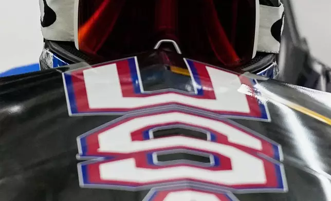 United States' Kaillie Armbruster Humphries, right, and Jasmine Jones start for a two women bobsled run at the 2026 Winter Olympics, in Cortina d'Ampezzo, Italy, Friday, Feb. 20, 2026. (AP Photo/Aijaz Rahi)