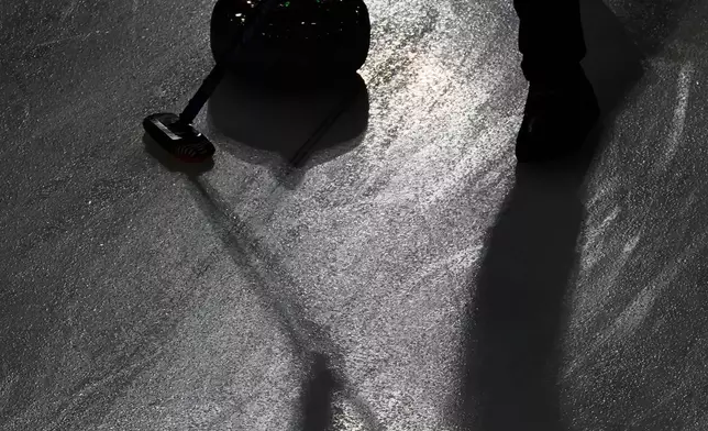 Cory Thiesse of the United States compete against Switzerland during the curling women's semifinal match at the 2026 Winter Olympics, in Cortina d'Ampezzo, Italy, Friday, Feb. 20, 2026. (AP Photo/Christophe Ena)