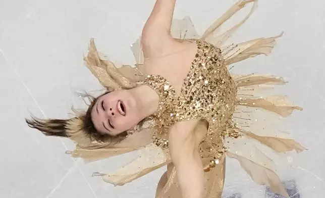 Alysa Liu of the United States competes during the women's figure skating free program at the 2026 Winter Olympics, in Milan, Italy, Thursday, Feb. 19, 2026. (AP Photo/Christophe Ena)