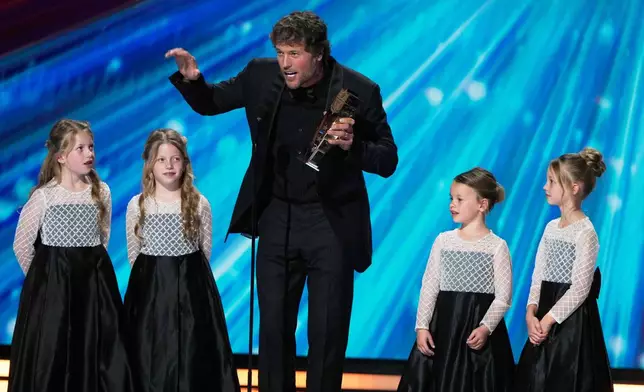 Los Angeles, Rams' Matthew Stafford accepts the AP Most Valuable Player awardduring the NFL Honors award show, Thursday, Feb. 5, 2026, in San Francisco. (AP Photo/Charlie Riedel)