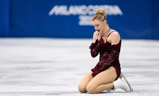 Amber Glenn of the United States competes during the women's short program figure skating at the 2026 Winter Olympics, in Milan, Italy, Tuesday, Feb. 17, 2026. (AP Photo/Natacha Pisarenko)