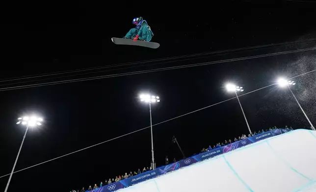Australia's Scotty James competes during the men's snowboarding halfpipe qualifications at the 2026 Winter Olympics, in Livigno, Italy, Wednesday, Feb. 11, 2026. (AP Photo/Gregory Bull)