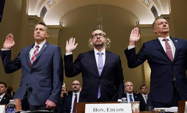 From left, Rodney Scott, commissioner of U.S. Customs and Border Protection, Joseph Edlow, director of U.S. Citizenship and Immigration Services and Todd Lyons, acting director of the U.S. Immigration and Customs Enforcement, are sworn in during a House Committee on Homeland Security oversight hearing of the Department of Homeland Security: ICE CBP and USCIS, on Capitol Hill, Tuesday, Feb. 10, 2026, in Washington. (AP Photo/Tom Brenner)