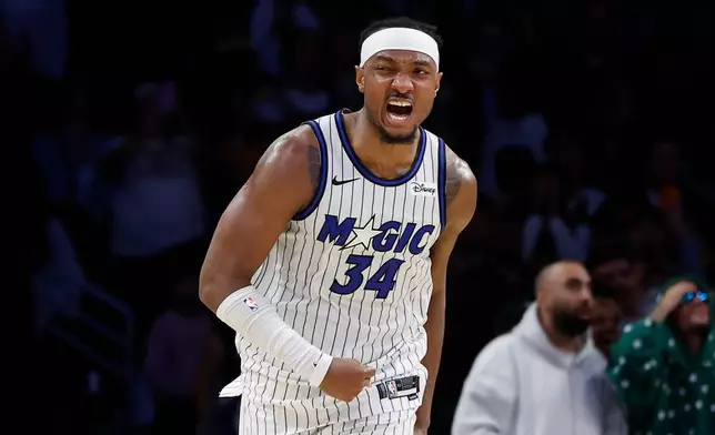 Orlando Magic center Wendell Carter Jr. (34) reacts after scoring during the second half of an NBA basketball game against the Los Angeles Lakers, Tuesday, Feb. 24, 2026, in Los Angeles. (AP Photo/Caroline Brehman)