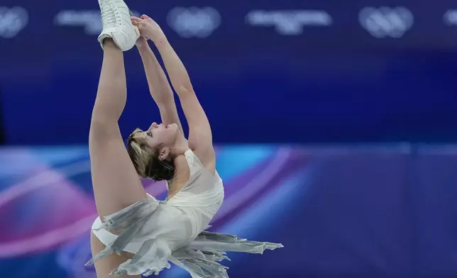 Alysa Lui of the United States competes during the figure skating women's team event at the 2026 Winter Olympics, in Milan, Italy, Friday, Feb. 6, 2026. (AP Photo/Stephanie Scarbrough)