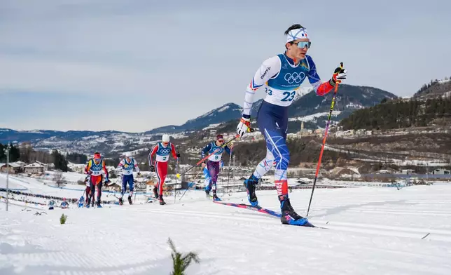 Theo Schely, of France, competes in the cross country skiing men's 50km mass start Classic at the 2026 Winter Olympics, in Tesero, Italy, Saturday, Feb. 21, 2026. (AP Photo/Evgeniy Maloletka)