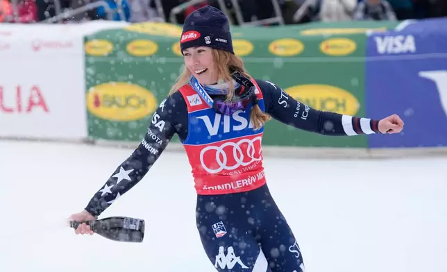 United States' Mikaela Shiffrin celebrates winning an alpine ski, women's World Cup slalom, in Spindleruv Mlyn, Czech Republic, Sunday, Jan. 25, 2026. (AP Photo/Giovanni Auletta)