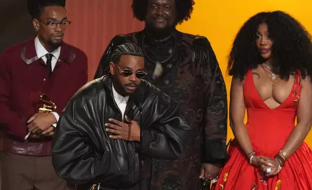 Ruchaun Akers, from left, Sounwave, Kamasi Washington, and SZA accept the award for record of the year for "Luther" during the 68th annual Grammy Awards on Sunday, Feb. 1, 2026, in Los Angeles. (AP Photo/Chris Pizzello)