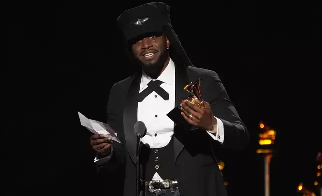 Shaboozey accepts the award for best country duo/group performance for "Amen" by Shaboozey and Jelly Roll during the 68th annual Grammy Awards on Sunday, Feb. 1, 2026, in Los Angeles. (AP Photo/Chris Pizzello)