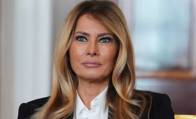 First lady Melania Trump listens as she meets with freed American-Israeli hostage Keith Siegel and his wife Aviva at the White House, Wednesday, Feb. 4, 2026, in Washington. (AP Photo/Evan Vucci)