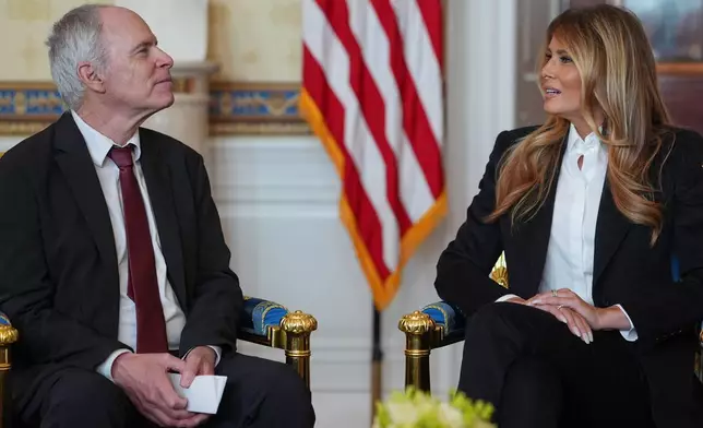 First lady Melania Trump meets with freed American-Israeli hostage Keith Siegel at the White House, Wednesday, Feb. 4, 2026, in Washington. (AP Photo/Evan Vucci)