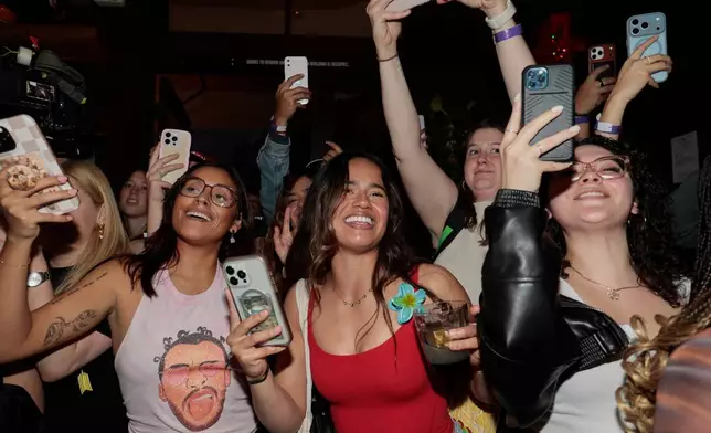 Crowds cheer for contestants at the Bad Bunny look-alike contest at Tacolicious in San Francisco, Thursday, Feb. 5, 2026. (Giselle Garza Lerma/San Francisco Chronicle via AP)