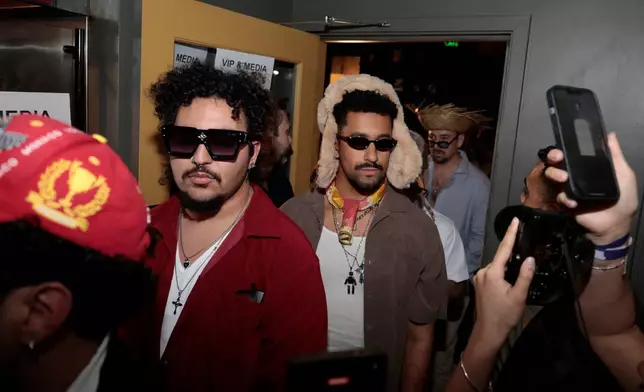 Contestants line up at the Bad Bunny look-alike contest line up at Tacolicious in San Francisco, Thursday, Feb. 5, 2026. (Giselle Garza Lerma/San Francisco Chronicle via AP)