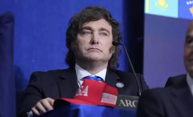 Argentina's President Javier Milei is seen during a Board of Peace meeting at the U.S. Institute of Peace, Thursday, Feb. 19, 2026, in Washington. (AP Photo/Mark Schiefelbein)