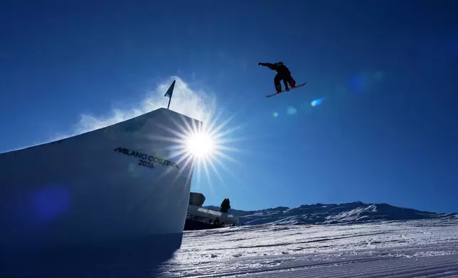Britain's Maisie Hill competes during the women's snowboarding slopestyle qualifications at the 2026 Winter Olympics, in Livigno, Italy, Feb. 15, 2026. (AP Photo/Gregory Bull, File)