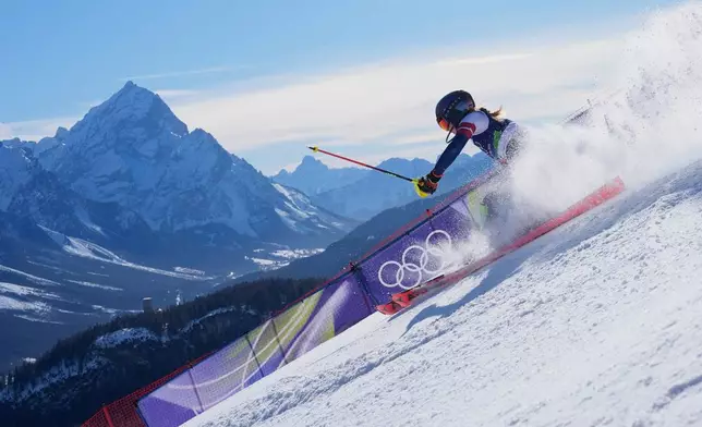 Mikaela Shiffrin competes in the women's slalom race at the 2026 Winter Olympics, in Cortina d'Ampezzo, Italy, Feb. 18, 2026. (AP Photo/Robert F. Bukaty, File)