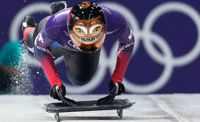 South Korea's Hong Sujung starts for a women's skeleton training session at the 2026 Winter Olympics, in Cortina d'Ampezzo, Italy, Feb. 11, 2026. (AP Photo/Aijaz Rahi, File)