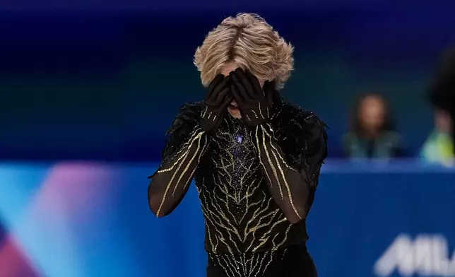 Ilia Malinin of the United States competes during the men's free skate program in figure skating at the 2026 Winter Olympics, in Milan, Italy, Friday, Feb. 13, 2026. (AP Photo/Ashley Landis)