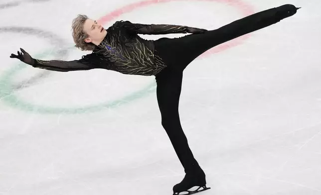 Ilia Malinin of the United States competes during the men's free skate program in figure skating at the 2026 Winter Olympics, in Milan, Italy, Friday, Feb. 13, 2026. (AP Photo/Francisco Seco)