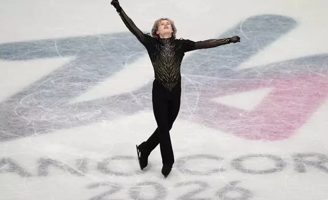 Ilia Malinin of the United States competes during the men's free skate program in figure skating at the 2026 Winter Olympics, in Milan, Italy, Friday, Feb. 13, 2026. (AP Photo/Francisco Seco)