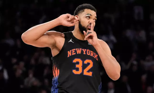 New York Knicks center Karl-Anthony Towns reacts during the second half of an NBA basketball game against the Indiana Pacers, Tuesday, Feb. 10, 2026, in New York. (AP Photo/Yuki Iwamura)