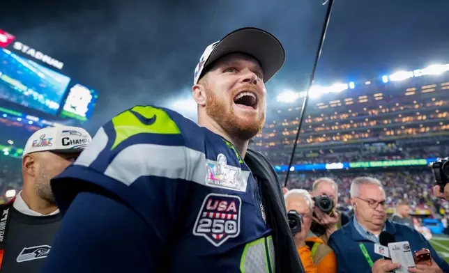 Seattle Seahawks quarterback Sam Darnold celebrates after defeating the New England Patriots in the NFL Super Bowl 60 football game, Sunday, Feb. 8, 2026, in Santa Clara, Calif. (AP Photo/Brynn Anderson)