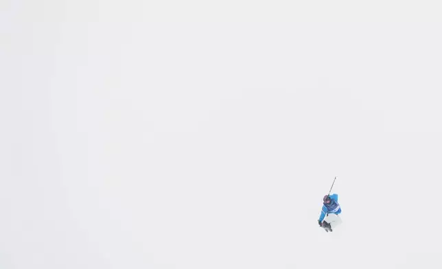 Italy's Flora Tabanelli practices during a slopestyle training session at the 2026 Winter Olympics, in Livigno, Italy, Wednesday, Feb. 4, 2026. (AP Photo/Lindsey Wasson)