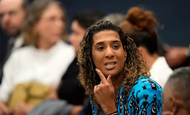 Racial Equality Minister Anielle Franco attends the first day of trial of those accused of ordering the murder of her sister, councilwoman Marielle Franco, at the Supreme Court in Brasilia, Brazil, Tuesday, Feb. 24, 2026. (AP Photo/Eraldo Peres)