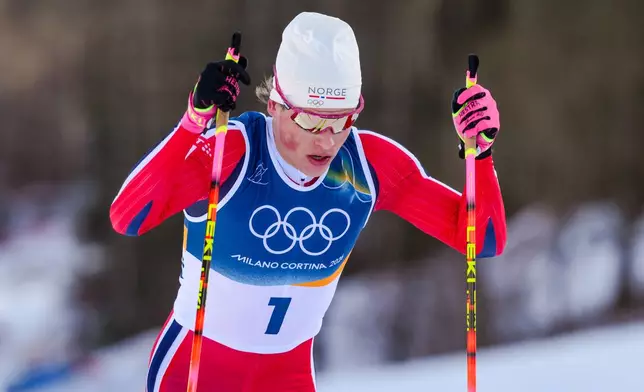 Johannes Hoesflot Klaebo, of Norway, competes in the cross country skiing men's 10km + 10km skiathlon at the 2026 Winter Olympics, in Tesero, Italy, Sunday, Feb. 8, 2026. (AP Photo/Evgeniy Maloletka)