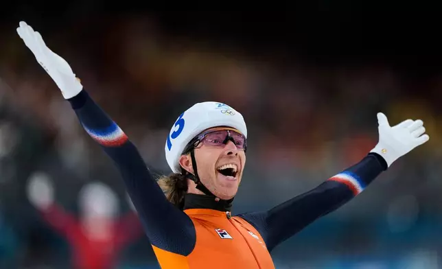 Gold medallist Jorrit Bergsma of the Netherlands celebrates winning the men's mass start final speedskating race at the 2026 Winter Olympics, in Milan, Italy, Saturday, Feb. 21, 2026. (AP Photo/Ben Curtis)