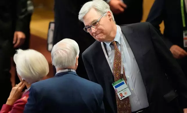 Sen. Sheldon Whitehouse D-R.I., right, speaks to Sen. Lindsey Graham, R-S.C. at the Munich Security Conference in Munich, Germany, Saturday, Feb. 14, 2026. (AP Photo/Alex Brandon, Pool)