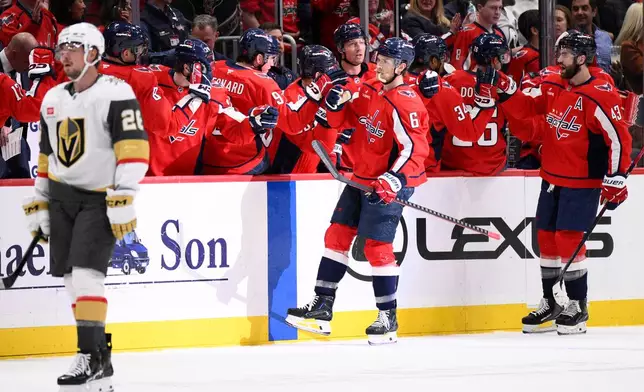 Washington Capitals defenseman Jakob Chychrun (6) celebrates his goal during the second period of an NHL hockey game against the Vegas Golden Knights, Friday, Feb. 27, 2026, in Washington. (AP Photo/Nick Wass)