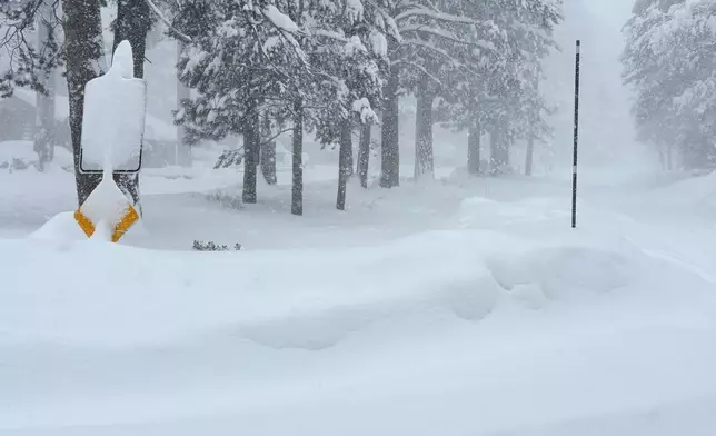 Snow falls on Tuesday, Feb. 17, 2026 in Truckee Calif. (AP Photos/Brooke Hess-Homeier)