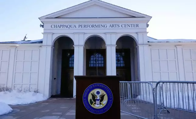 A podium sits outside the Chappaqua Performing Arts Center before the arrival of former Secretary of State Hillary Clinton who is testifying before U.S. House lawmakers as part of a congressional investigation into convicted sex offender Jeffrey Epstein, Thursday, Feb. 26, 2026, in Chappaqua, N.Y. (AP Photo/Yuki Iwamura)