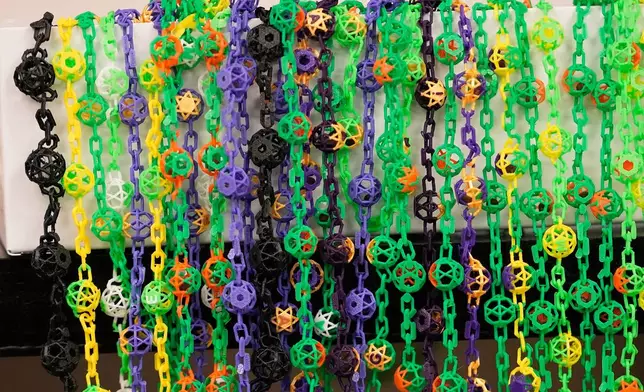 Biodegradable Mardi Gras beads being developed by Louisiana State University are seen inside a lab, Jan. 27, 2026, in Baton Rouge, La. (AP Photo/Gerald Herbert)
